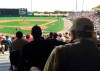 FILE - In this March 5, 2016, file photo, Tommy Giordano, right foreground, special assistant to the general manager of the Atlanta Braves, scouts a spring training baseball game between the Braves and the Pittsburgh Pirates, in Kissimmee, Fla. Tommy Giordano is dying. But do not let your heart be heavy. He‚Äôs going out like he lived for more than 93 years _ surrounded by family and friends, accompanied by overwhelming love and stories that will endure long after he‚Äôs gone. (AP Photo/Paul Newberry, File)