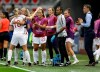 England head coach Philip Neville, right, applaudes as England's scorer Ellen White, left, and her teammates celebrate the opening goal during the Women's World Cup Group D soccer match between Japan and England at the Stade de Nice in Nice, France, Wednesday, June 19, 2019. (AP Photo/Claude Paris)