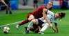 Argentina's Estefania Banini, left, and England's Jill Scott, right, challenge for the ball during the Women's World Cup Group D soccer match between England and Argentina at the Stade Oceane in Le Havre, France, Friday, June 14, 2019. (AP Photo/Alessandra Tarantino)