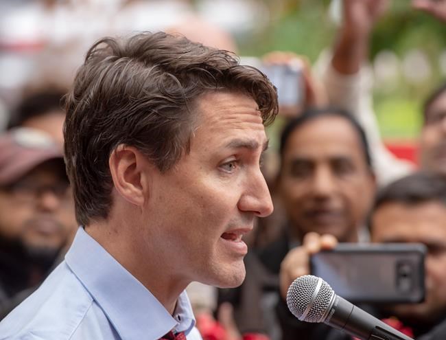 Liberal leader Justin Trudeau speaks to the media while campaigning Thursday, October 3, 2019 in Montreal, Que..THE CANADIAN PRESS/Ryan Remiorz
