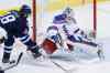 John Woods / The Canadian Press
New York Rangers goaltender Henrik Lundqvist (30) gets a pad on the shot from Winnipeg Jets' Bryan Little (18) during first period.