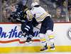 JOHN WOODS / WINNIPEG FREE PRESS
Winnipeg Jets defenceman Tobias Enstrom gets smashed into the boards by Buffalo Sabres enforcer Steve Ott during first-period NHL action at the MTS Centre in Winnipeg Tuesday.