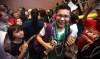 Phil Hossack / Winnipeg Free Press
A thrilled Brandon Courchene works his way through a throng at the Winnipeg airport Tuesday night as hundreds welcomed Sagkeeng's Finest home after the dance trio won the Canada's Got Talent reality TV series.