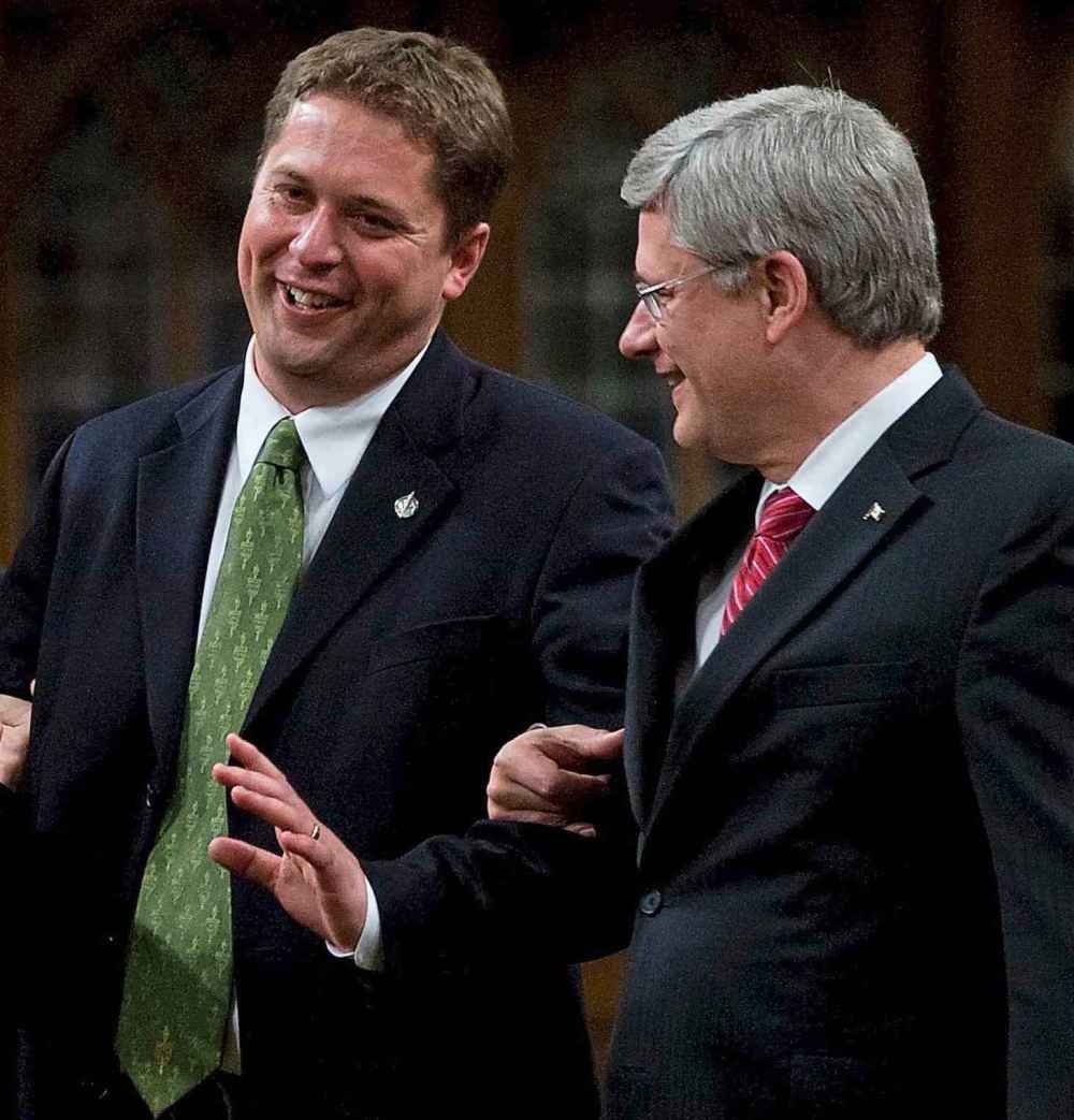 THE CANADIAN PRESS/Adrian Wyld
Andrew Scheer, left, with then-Prime Minister Stephen Harper in 2011. Harper ran a deficit six times as prime minister and added nearly $167 billion to the national debt.