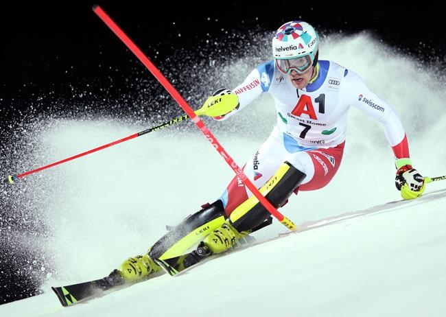 Switzerland's Daniel Yule competes in an alpine ski, men's World Cup slalom in Schladming, Austria, Tuesday, Jan. 29, 2019. (AP Photo/Shinichiro Tanaka)