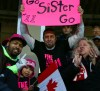 Melissa Tait / Winnipeg Free Press
Desiree Scott's family watches Desiree play for Canada for the first time. Brother Nick Scott (from left), foster sister Charlie, brother Christopher Hawkins and mother Charlene Gusberti watch Desiree (left, No. 11) on Thursday.