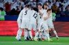 Real Madrid's players celebrate after scoring during the Club World Cup final soccer match between Real Madrid and Al Ain at Zayed Sport City in Abu Dhabi, United Arab Emirates, Saturday, Dec. 22, 2018. (AP Photo/Hassan Ammar)