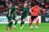 South Korea's Son Heung-min, right, is challenged by Australia's Bailey Wright, left, and James Jeggo, second right, during a friendly soccer match between South Korea And Australia at the Busan Asiad Main Stadium in Busan, South Korea, Friday, June 7, 2019. (Han Jong-chan/Yonhap via AP)