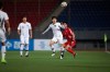 In this photo provided by the Korea Football Association, South Korea's Kim Jin-su fights for the ball against North Korea's Pak Kwang Ryong, right, during their Asian zone Group H qualifying soccer match for the 2022 World Cup at Kim Il Sung Stadium in Pyongyang, North Korea, Tuesday, Oct. 15, 2019. (The Korea Football Association via AP)
