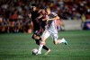 Toronto FC's Jacob Shaffelburg, right, runs the ball around Ottawa Fury FC's Wal Fall during the second half of semifinal Canadian Championship soccer action in Ottawa on Wednesday, Aug 7, 2019. THE CANADIAN PRESS/Sean Kilpatrick