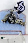 Gene J. Puskar / The Associated Press
Winnipeg Jets' Jim Slater puts the puck behind Pittsburgh Penguins goalie Brad Thiessen for a goal during the first period of their NHL game in Pittsburgh Tuesday. The Penguins won 8-4.
