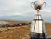 Michel LaRiviere / Travel Manitoba
A polar-bear, unbeknownst, poses for a picture with the Grey Cup. The trophy was in Churchill as part of an eight-day tour through northern Manitoba to help promote the Grey Cup game in Winnipeg this year.