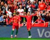 Portugal's Cristiano Ronaldo, right, celebrates after scoring his side's first goal during the UEFA Nations League semifinal soccer match between Portugal and Switzerland at the Dragao stadium in Porto, Portugal, Wednesday, June 5, 2019. (AP Photo/Martin Meissner)