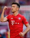 Bayern's Ivan Perisic celebrates after scoring his side's fourth goal during the German Bundesliga soccer match between FC Bayern Munich and 1. FC Cologne in Munich, Germany, Saturday, Sept. 21, 2019. (AP Photo/Matthias Schrader)