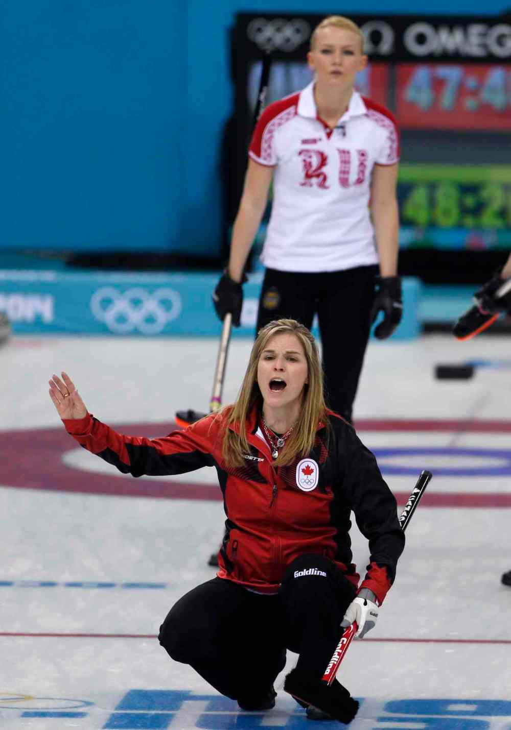 Robert F. Bukaty / The Associated Press
Canada's skip Jennifer Jones shouts to her teammates during their match against Russia Saturday in Sochi.