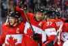 Julio Cortez / The Associated Press
Canada defenceman Shea Weber, center, celebrates with forward Sidney Crosby, left, and forward Patrice Bergeron after scoring a goal against Norway.