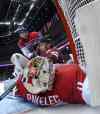 Bruce Bennett / Pool, The Associated Press files
Czech Republic goaltender Ondrej Pavelec falls into the net as Latvia forward Martins Karsums collides with him in the second period of a men's ice hockey game at the 2014 Winter Olympics on Friday, Feb. 14, 2014, in Sochi, Russia.