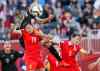 JOHN WOODS / THE CANADIAN PRESS 
New Zealand’s Hanna Wilkinson goes up and over China’s Ruyin Tan to connect on a header in the first half of their match at Investors Group Field Monday.
