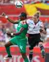 JUSTIN TANG / THE CANADIAN PRESS Files
Germany's Simone Laudehr (right) battles for the ball with the Ivory Coast's Josee Nahi during a 10-0 thrashing Germany applied last Sunday in Ottawa.