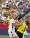 CP
United States' Abby Wambach (20) vies for the ball with Colombia's Nataly Arias (14) and Natalia Gaitan (3) during first half FIFA Women's World Cup round of 16 action in Edmonton, Alta., on Monday June 22.