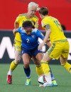 John Woods / THE CANADIAN PRESS
Sweden's Caroline Seger (17) and Therese Sjogran (15) go for the ball against United States' Sydney Leroux (2).