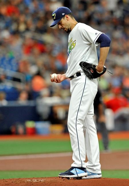 Tampa Bay Rays starter Charlie Morton looks at the ball between pitches against the Los Angeles Angels during the first inning of a baseball game Saturday, June 15, 2019, in St. Petersburg, Fla. (AP Photo/Steve Nesius)