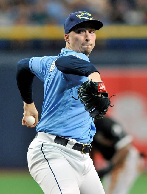 Tampa Bay Rays starter Blake Snell pitches against the Chicago White Sox during the first inning of a baseball game Sunday, July 21, 2019, in St. Petersburg, Fla. (AP Photo/Steve Nesius)