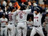 Houston Astros' George Springer (4) celebrates with Robinson Chirinos (28) and Jake Marisnick (6) after Springer hit a three-run home run off Tampa Bay Rays starting pitcher Blake Snell during the third inning of a baseball game Thursday, March 28, 2019, in St. Petersburg, Fla. (AP Photo/Chris O'Meara)