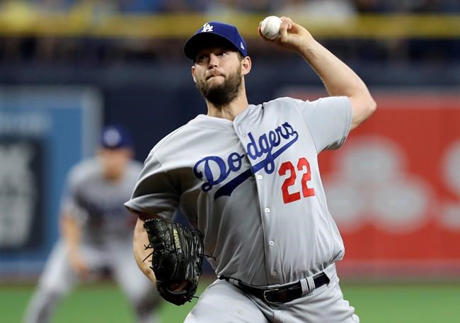 Los Angeles Dodgers starting pitcher Clayton Kershaw delivers to the Tampa Bay Rays during the first inning of a baseball game Tuesday, May 21, 2019, in St. Petersburg, Fla. (AP Photo/Chris O'Meara)
