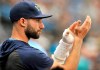 Tampa Bay Rays' Kevin Kiermaier cheers on his teammates from the dugout during the second inning of a baseball game against the Chicago White Sox Sunday, July 21, 2019, in St. Petersburg, Fla. Kiermaier injured his left thumb on a slide in Saturday's game. (AP Photo/Steve Nesius)