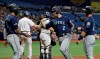 Seattle Mariners' Tom Murphy (2) celebrates with J.P. Crawford (3) and Austin Nola (23) after Murphy hit a three-run home run off Tampa Bay Rays starting pitcher Brendan McKay during the first inning of a baseball game, Monday, Aug. 19, 2019, in St. Petersburg, Fla. (AP Photo/Chris O'Meara)