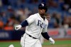 Tampa Bay Rays' Yandy Diaz points into the dugout after hitting a home run off Baltimore Orioles pitcher David Hess during the third inning of a baseball game Wednesday, April 17, 2019, in St. Petersburg, Fla. (AP Photo/Chris O'Meara)