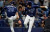 Tampa Bay Rays' Willy Adames, right, celebrates with Kevin Kiermaier after hitting a two-run home run off Boston Red Sox relief pitcher Bobby Poyner during the fourth inning of a baseball game Monday, Sept. 23, 2019, in St. Petersburg, Fla. (AP Photo/Chris O'Meara)
