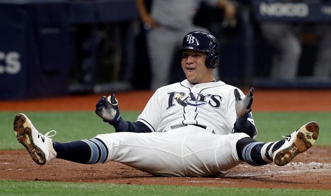 Tampa Bay Rays' Avisail Garcia celebrates after scoring on an inside-the-park home run off Toronto Blue Jays starting pitcher Clayton Richard during the third inning of a baseball game, Tuesday, May 28, 2019, in St. Petersburg, Fla. (AP Photo/Chris O'Meara)