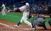 Tampa Bay Rays' Ji-Man Choi, of South Korea, lines an RBI-single off Arizona Diamondbacks relief pitcher Yoshihisa Hirano during the seventh inning of a baseball game, Tuesday, May 7, 2019, in St. Petersburg, Fla. Rays' Mike Zunino scored. Catching for Arizona is Carson Kelly. (AP Photo/Chris O'Meara)