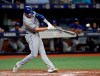 Toronto Blue Jays' Brandon Drury lines a single off Tampa Bay Rays relief pitcher Ryan Yarbrough during the fourth inning of a baseball game Tuesday, Aug. 6, 2019, in St. Petersburg, Fla. (AP Photo/Chris O'Meara)