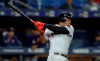 Boston Red Sox's Rafael Devers lines an RBI-single off Tampa Bay Rays relief pitcher Austin Pruitt during the fourth inning of a baseball game Monday, Sept. 23, 2019, in St. Petersburg, Fla. Boston's Marco Hernandez scored. (AP Photo/Chris O'Meara)
