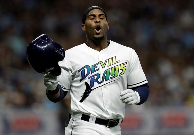 Tampa Bay Rays' Yandy Diaz reacts after flying out against the New York Yankees during the sixth inning of a baseball game Saturday, May 11, 2019, in St. Petersburg, Fla. (AP Photo/Chris O'Meara)