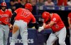 Los Angeles Angels' Albert Pujols (5) bows as he shakes hands with Shohei Ohtani (17), of Japan, after Pujols hit a two-run home run off Tampa Bay Rays' Ryan Yarbrough during the fifth inning of a baseball game Thursday, June 13, 2019, in St. Petersburg, Fla. (AP Photo/Chris O'Meara)