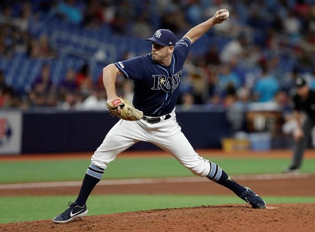 Tampa Bay Rays relief pitcher Adam Kolarek delivers to the Boston Red Sox during the eighth inning of a baseball game Wednesday, July 24, 2019, in St. Petersburg, Fla. (AP Photo/Chris O'Meara)