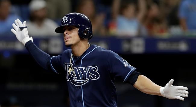 Tampa Bay Rays' Willy Adames celebrates his home run off Miami Marlins relief pitcher Jarlin Garcia during the eighth inning of a baseball game Saturday, Aug. 3, 2019, in St. Petersburg, Fla. (AP Photo/Chris O'Meara)