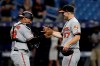 Baltimore Orioles pitcher John Means (67) celebrates with catcher Pedro Severino after closing out the Tampa Bay Rays during the 11th inning of a baseball game Thursday, April 18, 2019, in St. Petersburg, Fla. The Orioles won 6-5. (AP Photo/Chris O'Meara)