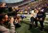 Brian Peterson / Tribune Media MCT Files
Former Minnesota Vikings coach Bud Grant and current Vikings Adrian Peterson share some time on the bench in Minneapolis in 2013.