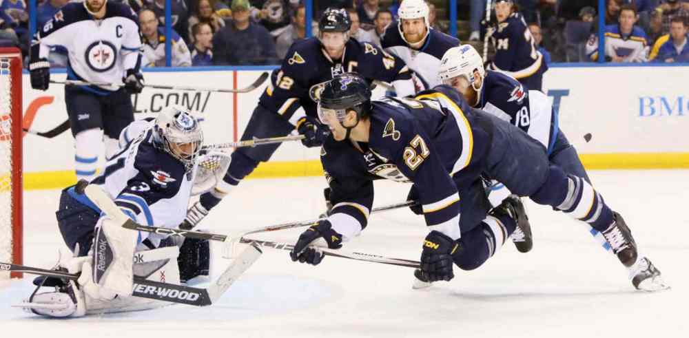 Chris Lee / Tribune Media TNS
The St. Louis Blues' Alex Pietrangelo (27) unsuccessfully tries to get a shot in on Winnipeg Jets goaltender Ondrej Pavalec in the first period. The Jets won the game 1-0.