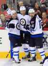 Chris Seward / MCT Archives
How much more of a tune-up do Bryan Little and wingers Andrew Ladd and Blake Wheeler need before the new NHL season begins Tuesday in Edmonton?