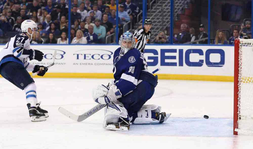 Dirk Shadd / Tribune Media TNS
Nikolaj Ehlers beats Tampa Bay Lightning goalie Andrei Vasilevskiy on a penalty shot in the second period. The Jets would go on to win 6-4.
