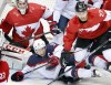 CARLOS GONZALEZ / Tribune Media MCT
Team USA captain Zach Parise learned the hard way just how little room Canada was offering in front of goalie Carey Price in Friday's semifinal.