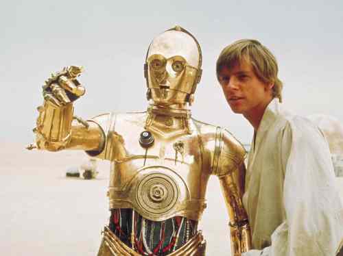Lucasfilm Ltd. / The Associated Press Files
C-3PO (Anthony Daniels), the droll droid of Star Wars fame, is shown with the character Luke Skywalker, played by Mark Hamill.