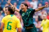 FILE - In this July 26, 2018, file photo, Australia's Sam Kerr, right, celebrates after her team scores against Brazil in the first half of a Tournament of Nations soccer match in Kansas City, Kan. USA. Kerr has been named captain of the women's national soccer, Wednesday, Feb. 27, 2019, as they prepared for Thursday's first match against New Zealand in the four-team Cup of Nations tournament. (AP Photo/Colin E. Braley, File)