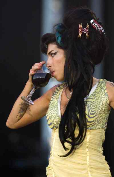 Victor R. Caivano / The Associated Press files
In this July 4, 2008 file photo, jazz soul singer Amy Winehouse, from England, performs during the Rock in Rio music festival in Arganda del Rey, on the outskirts of Madrid.